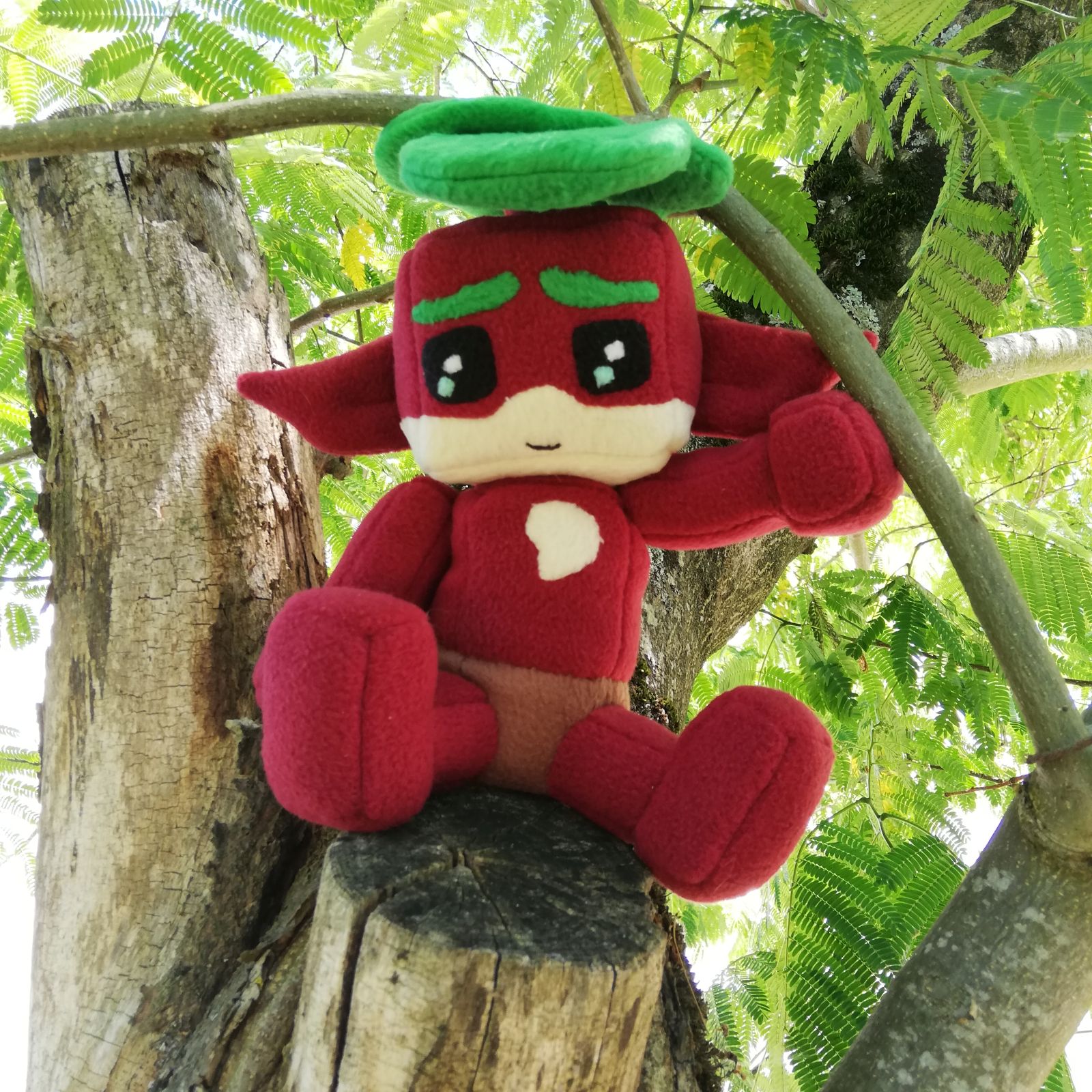 Профессиональная мягкая игрушка Квибека (Kweebec) ручной работы с зелёным телом, лиственными деталями и милым выражением